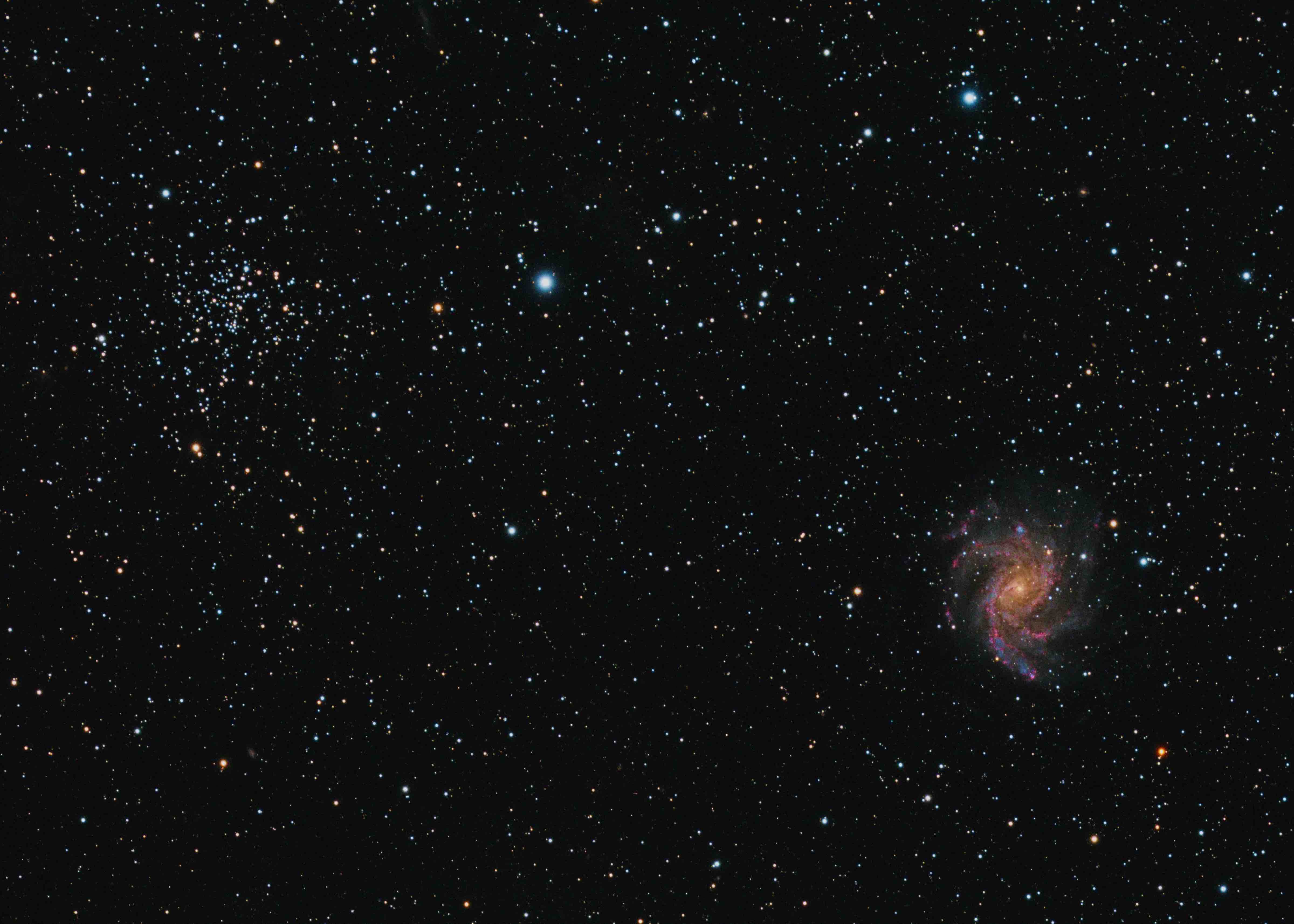 an image of the Fireworks galaxy (NGC 6946) next to the open star cluster NGC 6939 
