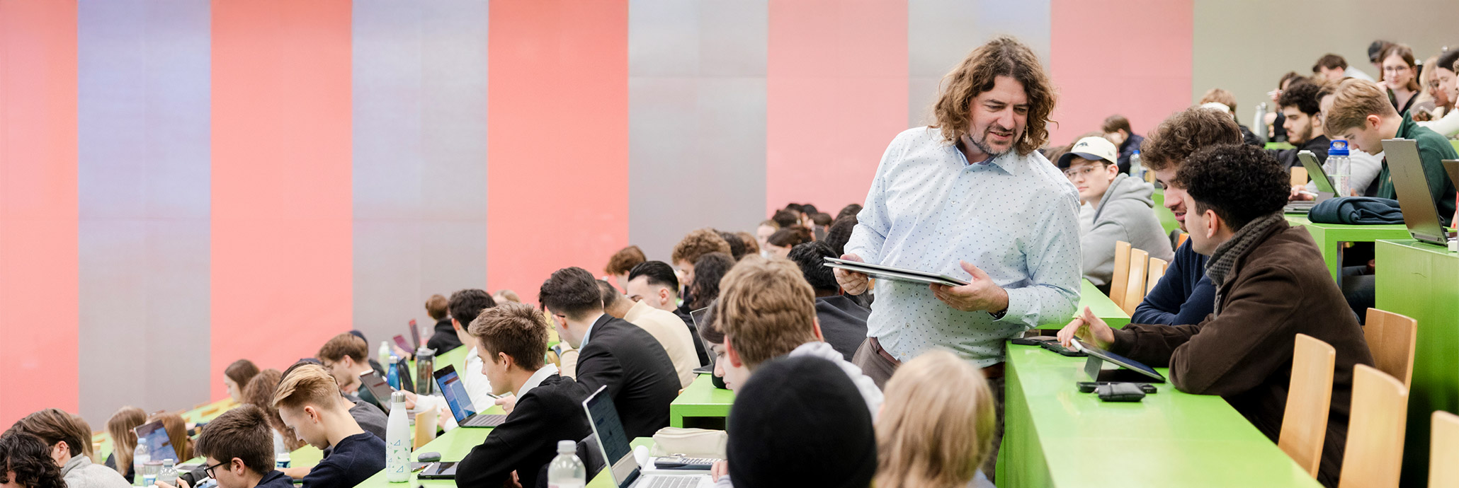 Teaching award winner Benjamin Wilding with students in the lecture hall