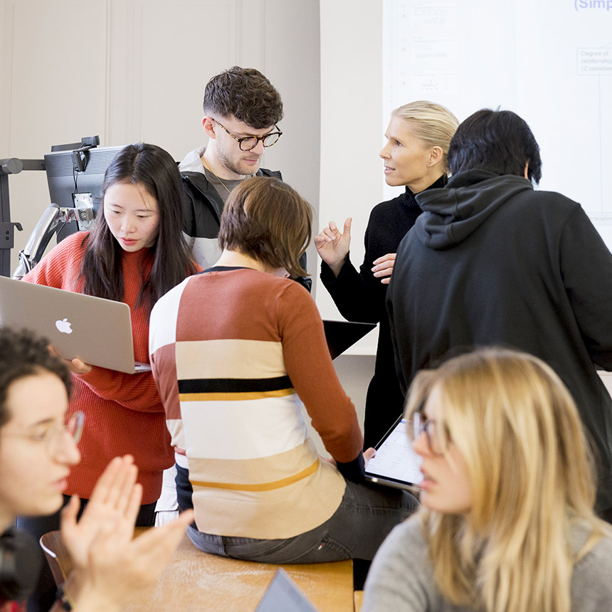 Lecturer with students in the lecture room